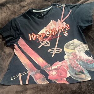 AKOO: VINTAGE GRAPHIC T-SHIRT. Black with multicolor design. Men’s size XXL.